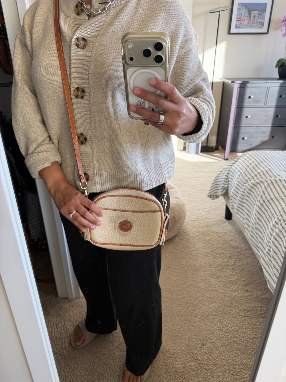 Cream Pebbled Crossbody Bag with Tan Trim and Adjustable Strap